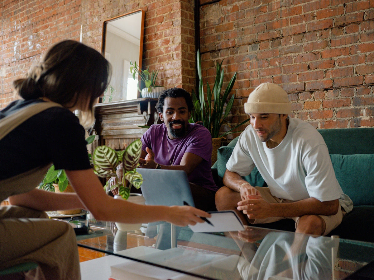 Startup team preparing products and storefront for an ecommerce launch